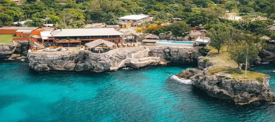 2. Experience the Negril Cliffs and Rick’s Cafe