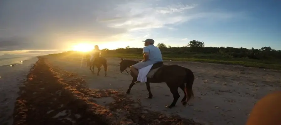 9. Sunset Horseback Riding on the Beach