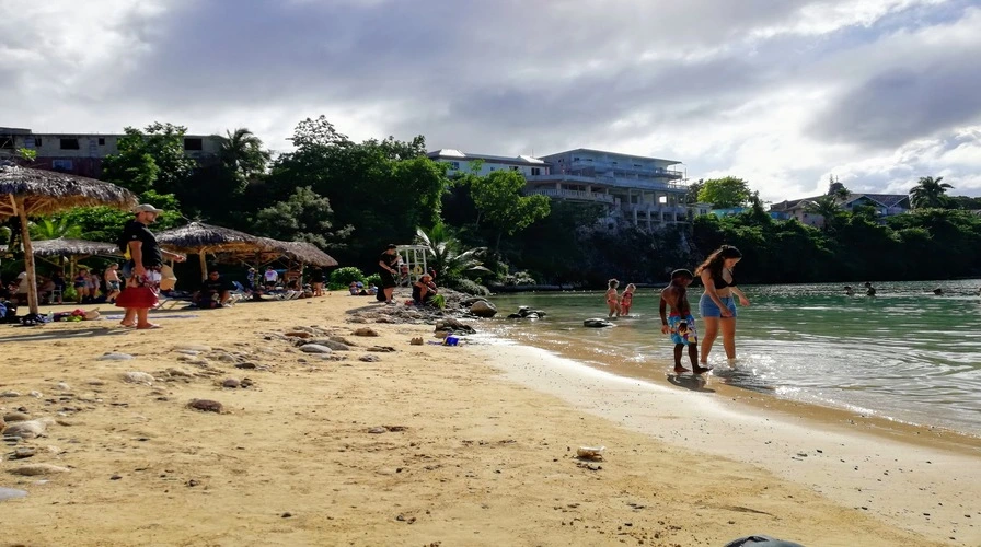 3. Stroll Hand-in-Hand Along Mahogany Beach